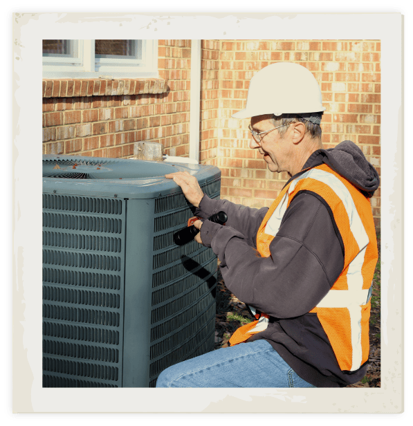 Kayl Heating & Air HVAC technician peforming AC repair in Grand Island, NE, and the Hall County area.